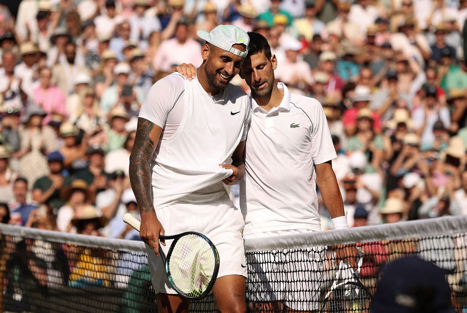 Nick Kyrgios and Novak Djokovic pictured at the 2022 Wimbledon Championships.